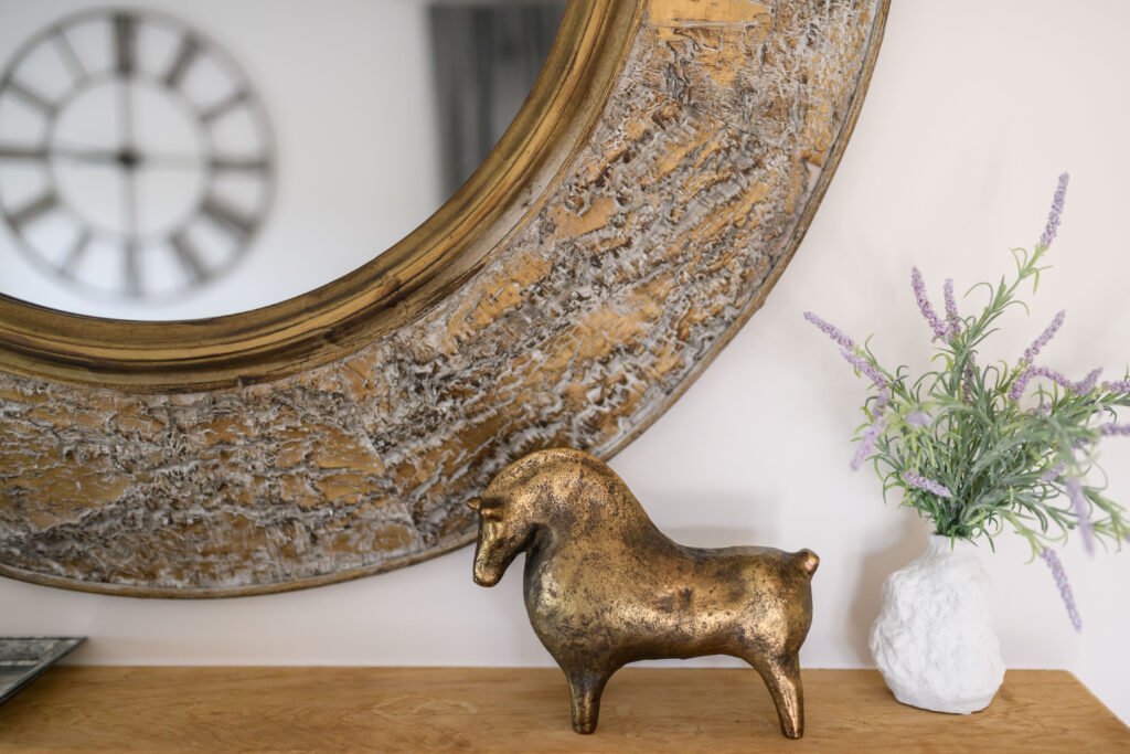 Console styling with gold horse figurine, greenery and ornate mirror – Residential project “Cloyne Farmhouse Part One”, designed by AK Interior, Cork, Ireland.