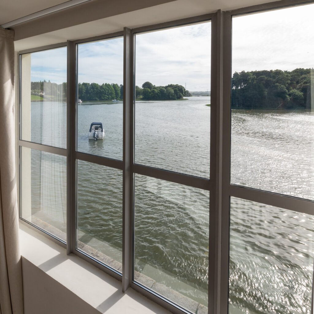 Water view through bedroom windows. West Cork Waterfront project by AK Interior, Cork, Ireland.