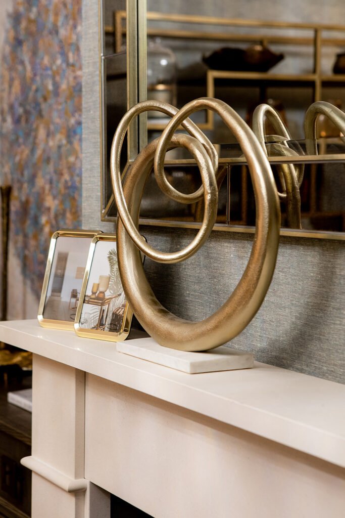 Gold decorative sculpture on the fireplace ledge – Blarney Residential, AK Interior, Cork