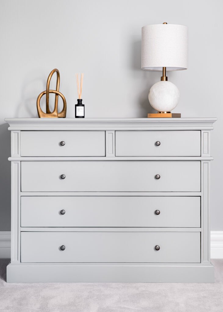 Grey dresser with ceramic lamp and minimalist decorative accents – Douglas Part One project, designed by AK Interior, Cork, Ireland.
