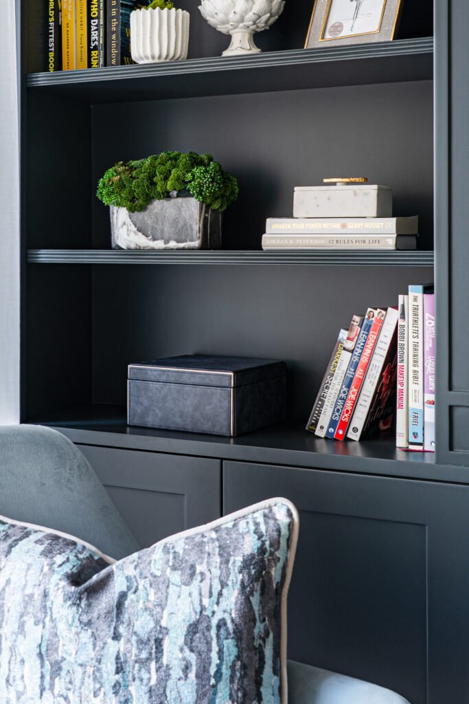 Velvet armchair cushion with shelving in the background – Douglas Part Two, AK Interior, Cork