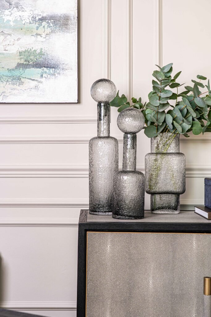 Stylish clear glass vases with greenery by wall panelling – Douglas Part Two, AK Interior, Cork