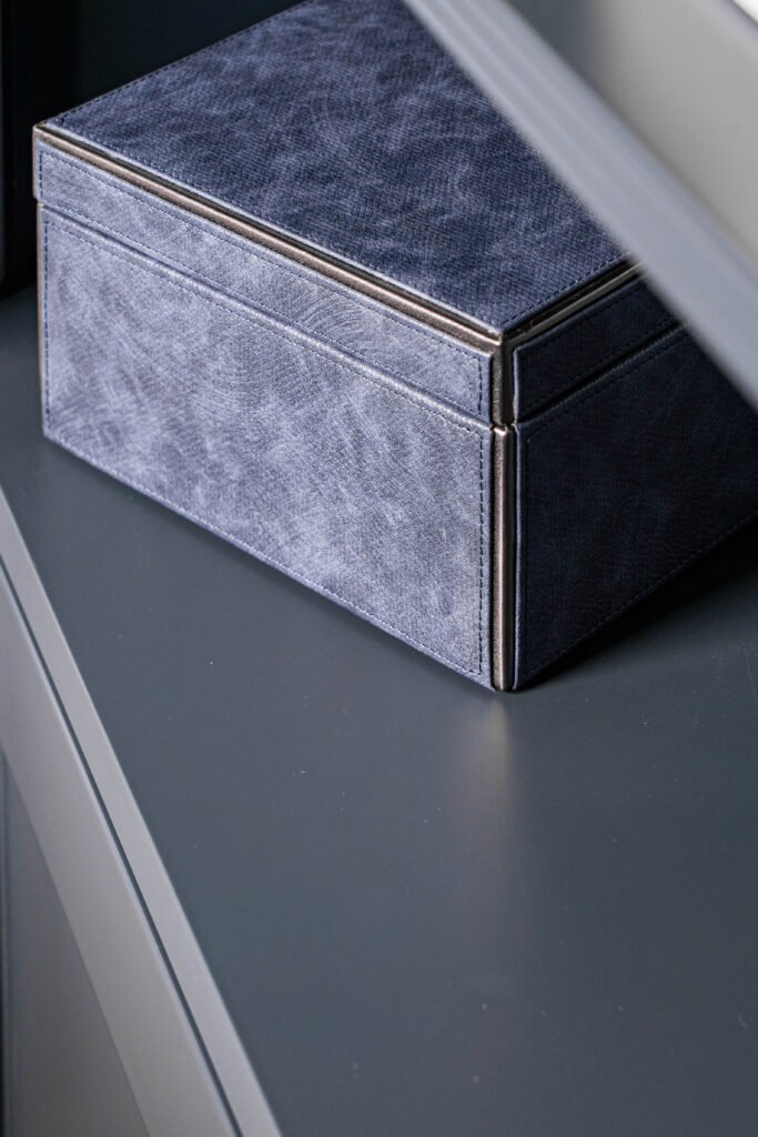 Dark velvet storage box on a built-in shelf – Douglas Part Two, AK Interior, Cork