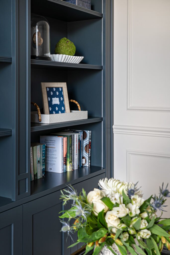 Decorative plants and books in dark shelving – Douglas Part Two, AK Interior, Cork