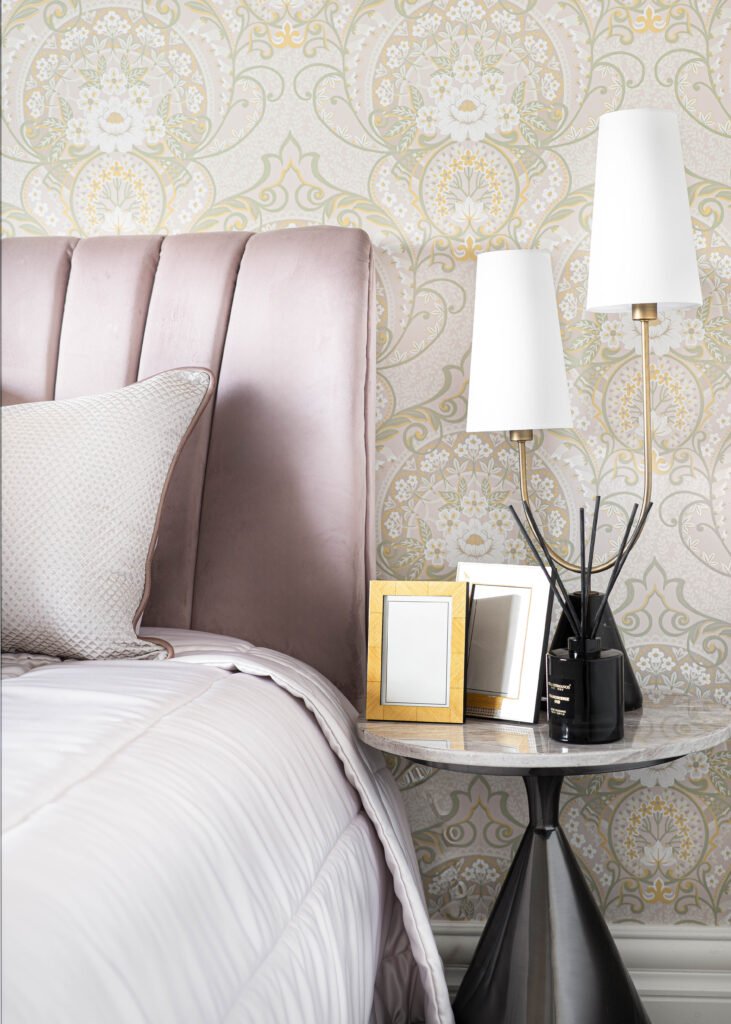 Bedside table with a tall lamp and gold picture frames – Douglas Part Two, AK Interior, Cork