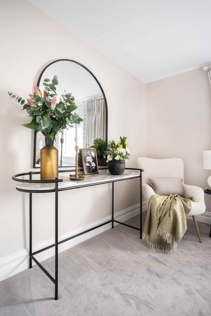 Console with mirror and floral arrangement in the bright bedroom – Douglas Part Two, AK Interior, Cork