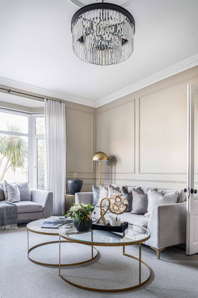 Living room area with grey seating, round tables and elegant curtains – Douglas Part Two, AK Interior, Cork