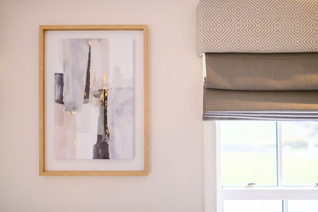 Wall art above window with textured Roman blind – Cloyne Farmhouse Part One project, designed by AK Interior, Cork, Ireland.