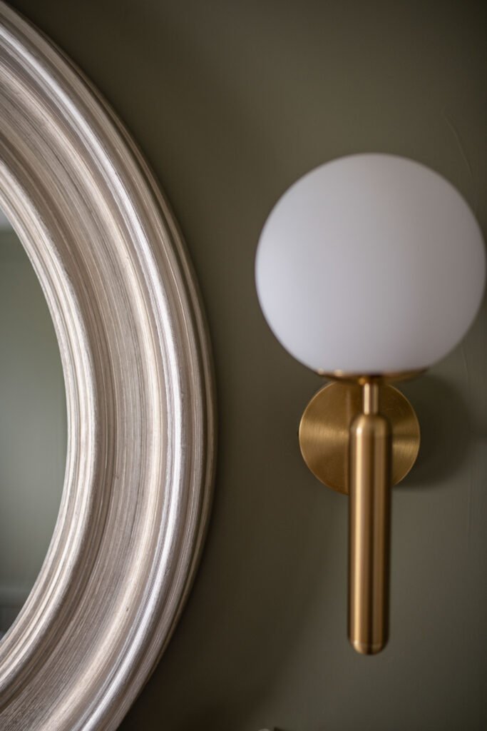 Close-up of wooden framed mirror with soft bathroom lighting – Cloyne Farmhouse Part Two project, designed by AK Interior, Cork, Ireland.