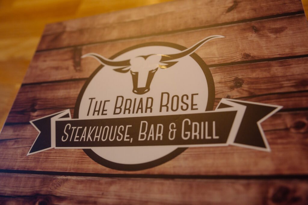 Decorative wall graphic and signage for The Briar Rose bar and grill. Briar Rose Commercial project, AK Interior, Cork.