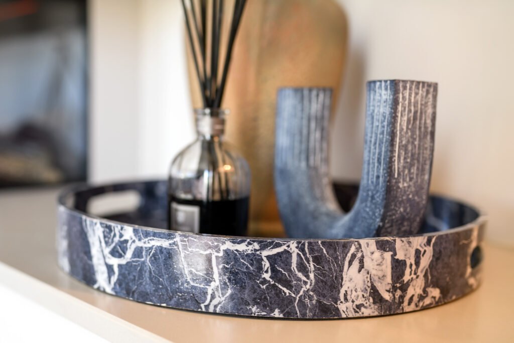 Marble-effect tray with reed diffuser and sculptural U-shaped object, Rathmore Residential project, AK Interior, Cork.
