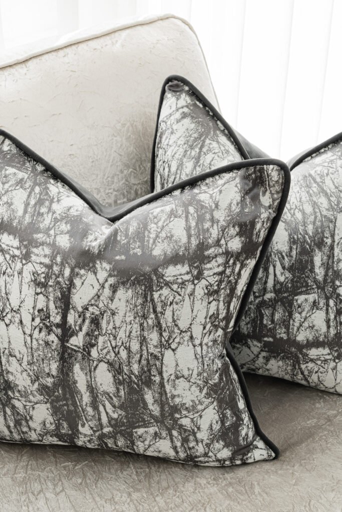 Decorative grey pillows on a sofa – Moneygurney Road Part One, AK Interior