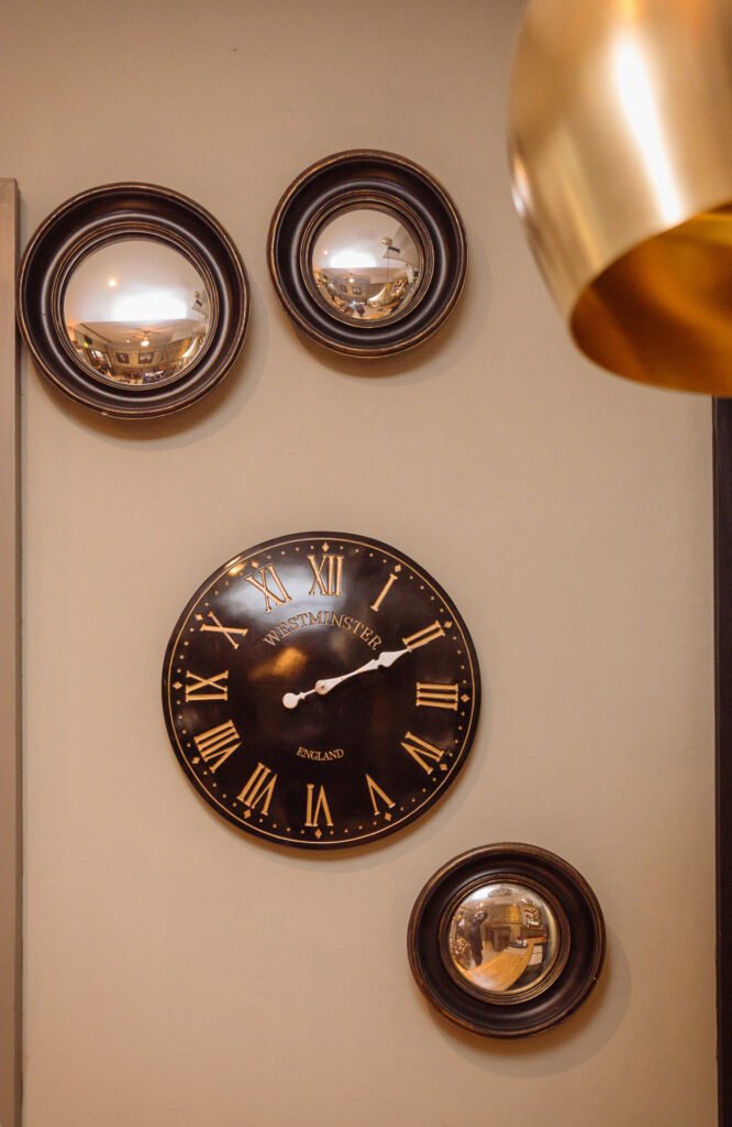 Wall with large decorative clock and smaller companion clock detail. Briar Rose Commercial project, AK Interior, Cork.