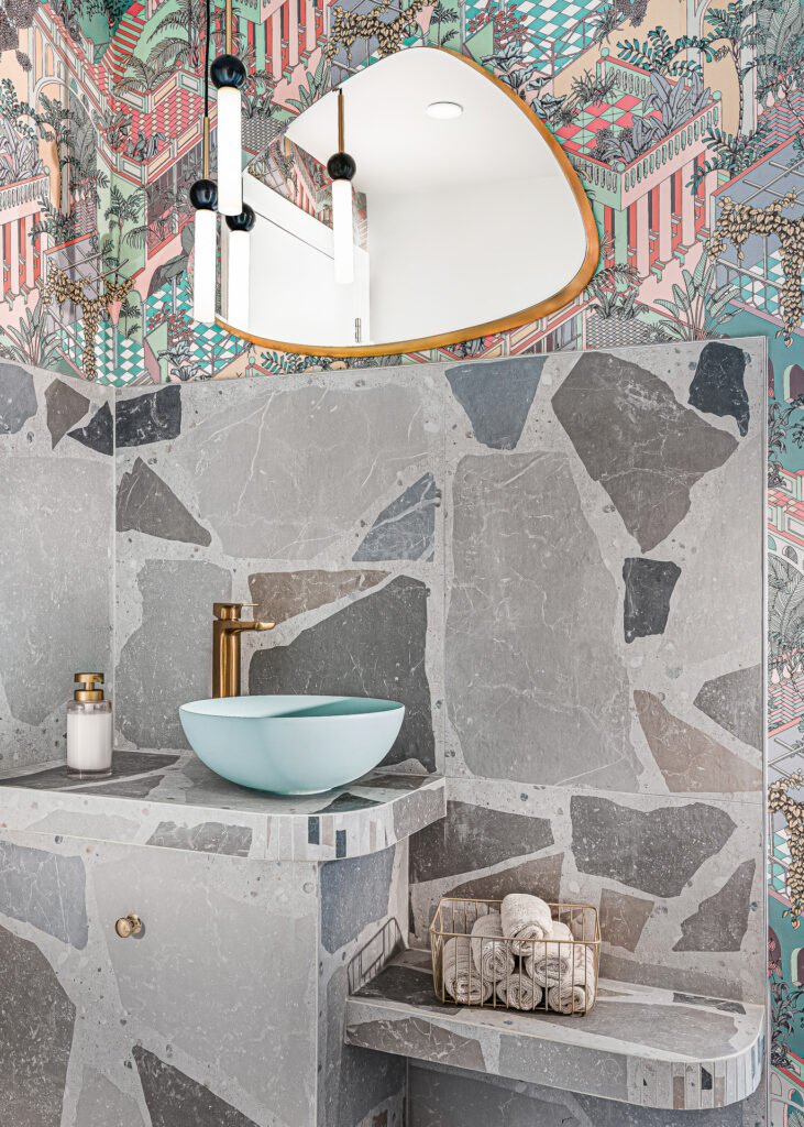 Patterned feature wall with an organic-shaped mirror and modern pendant lights – Bon Me project, designed by AK Interior Cork.