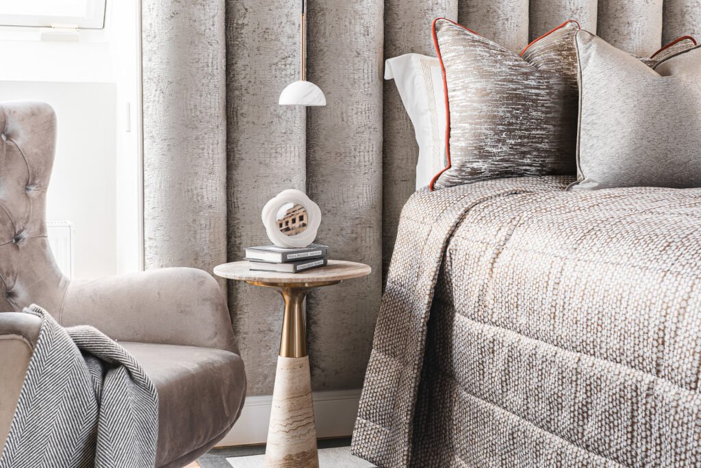 Bedside table with decor items – Moneygurney Road Part One, AK Interior