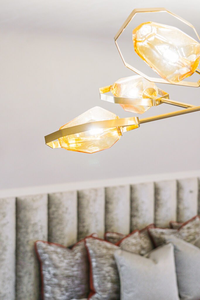 Golden modern ceiling light above the bed – Moneygurney Road Part One, AK Interior