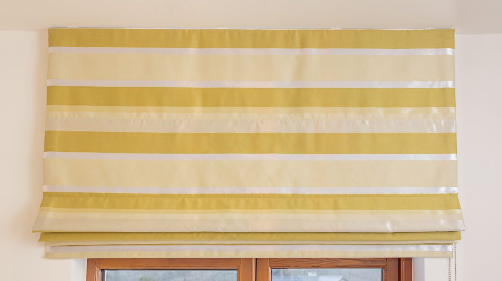 Yellow striped roman blind on window – Innishannon Showhouse by AK Interior, Cork Ireland.