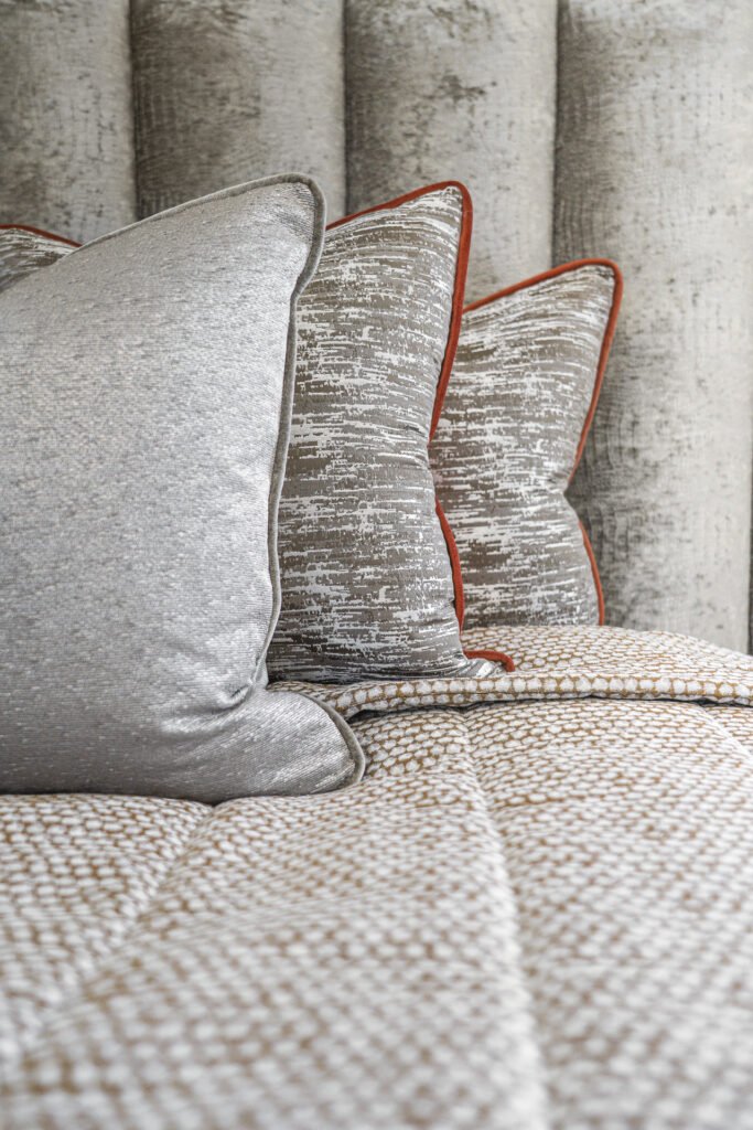 Silver and textured cushions on the bedroom bed – Moneygurney Road Part One, AK Interior