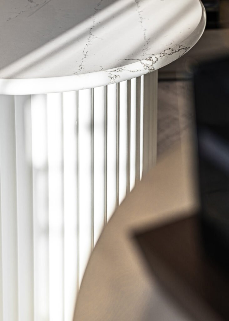 Close-up detail of marble-effect countertop with soft drapery – Bon Me project, designed by AK Interior Cork.