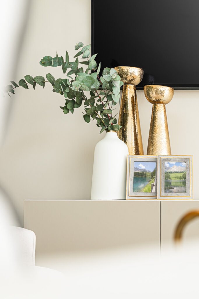 Gold vases with eucalyptus stems on living room console – Moneygurney Road Part One, AK Interior