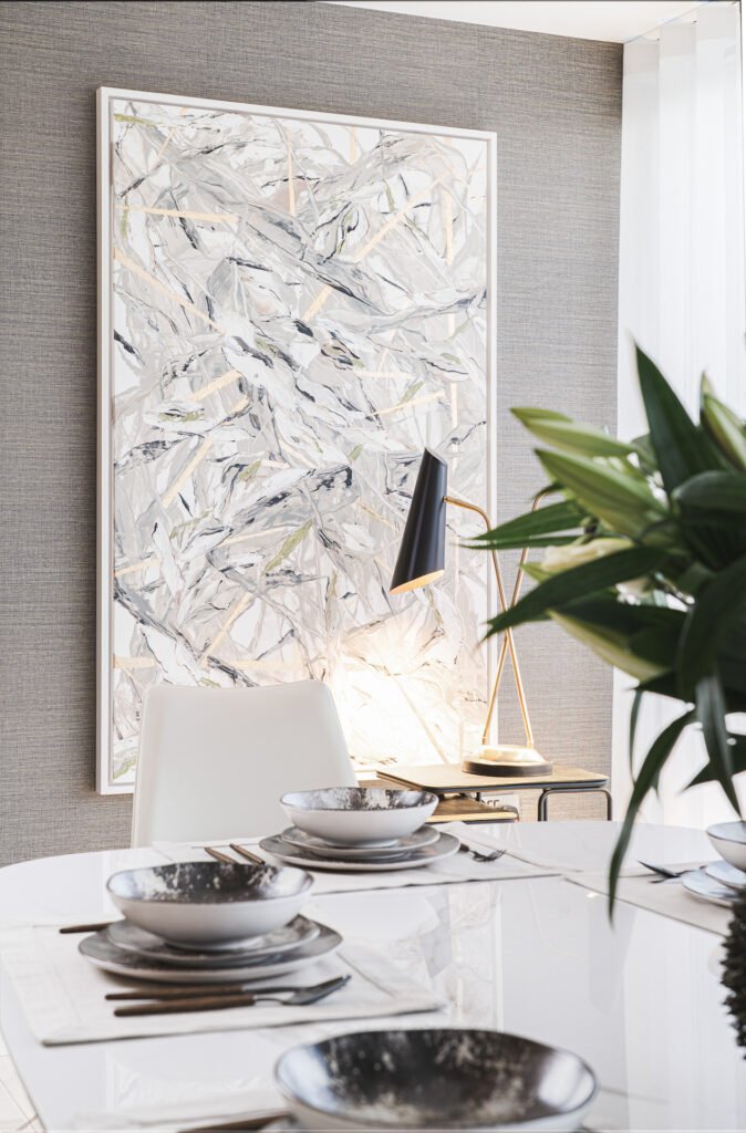 Close-up of textured wall and abstract artwork – Luxury Living Room Part Two by AK Interior.