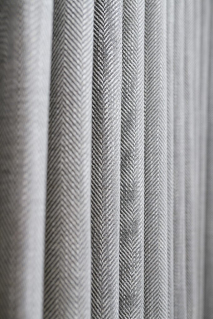 Close-up of textured grey curtains – Whitegate Holiday Home, AK Interior, Cork