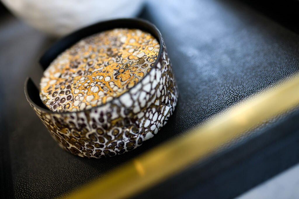 Close-up of a decorative candle holder and bowl – Whitegate Holiday Home, AK Interior, Cork