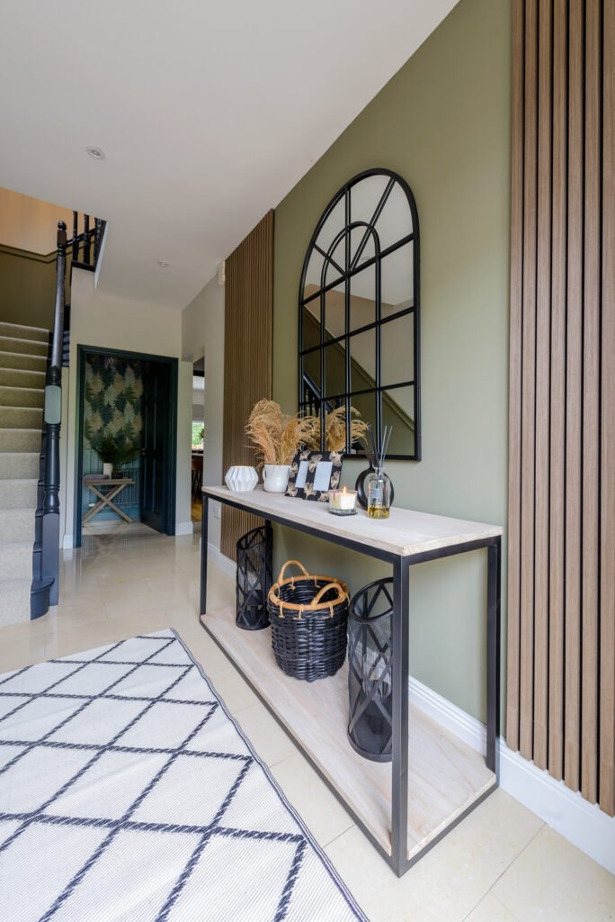 Entryway with a large mirror and light patterned rug – Whitegate Holiday Home, AK Interior, Cork