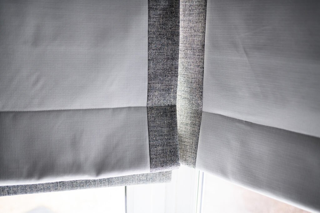 Close-up of a grey blind with two-tone fabric detail – Whitegate Holiday Home, AK Interior, Cork