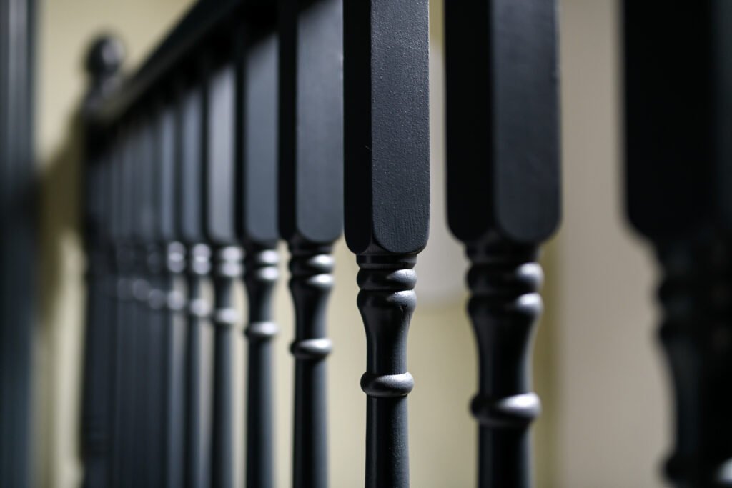 Close-up of black stair railing details – Whitegate Holiday Home, AK Interior, Cork