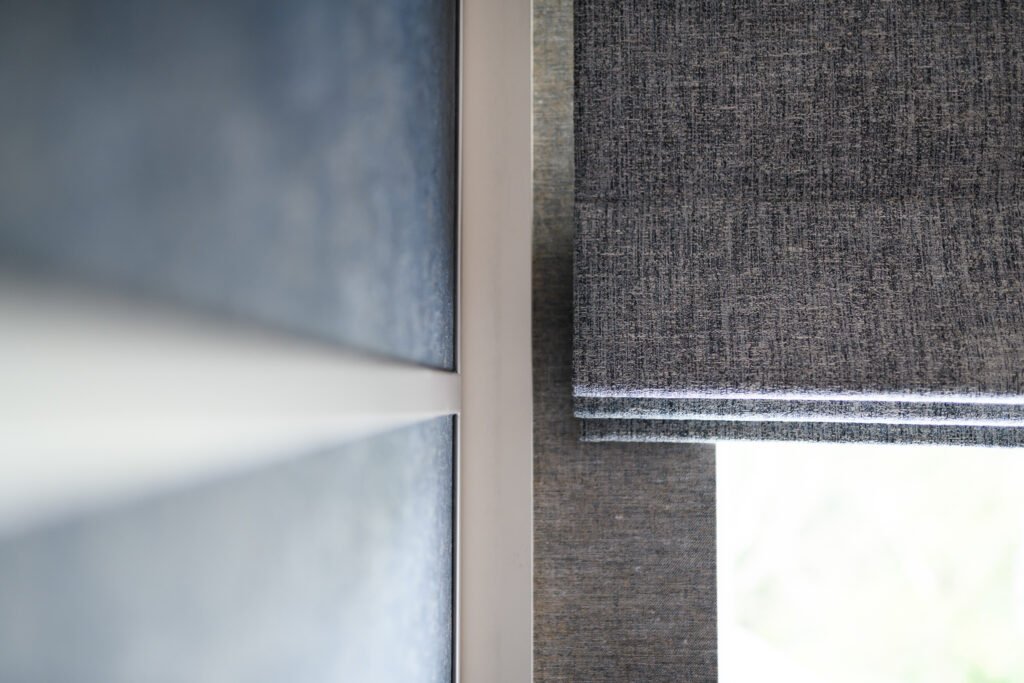 Detail of textured blue wardrobe panel with slim pale frame in modern fitted wardrobes, AK Interior Design, Cork, Ireland
