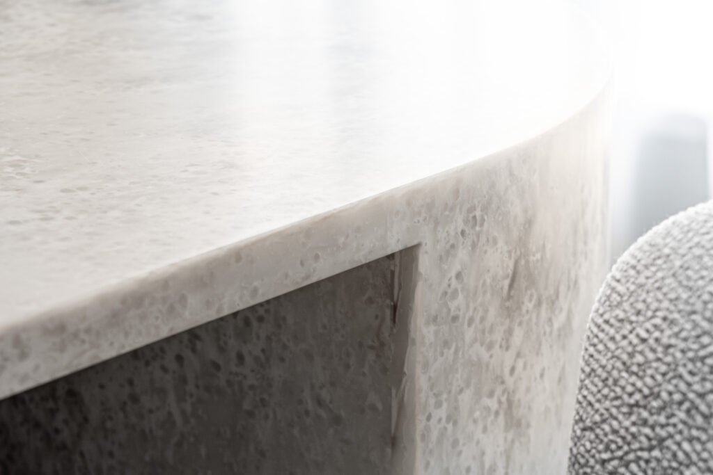 Close-up of a textured stone kitchen island edge – AK Interior Design, Cork
