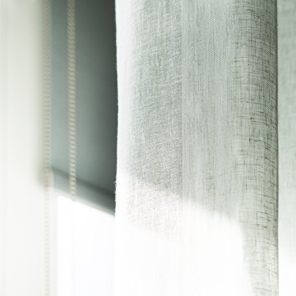 Close-up of light sheer curtain fabric in natural daylight – West Cork Waterfront, residential project by AK Interior, Cork, Ireland.