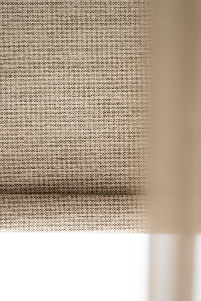 Detail of woven blind texture with soft curtain overlay – Residential project “West Cork Waterfront”, designed by AK Interior, Cork, Ireland.