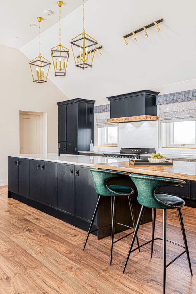 Modern kitchen with black cabinetry and gold pendant lighting – Dingle project, designed by AK Interior, Cork, Ireland.
