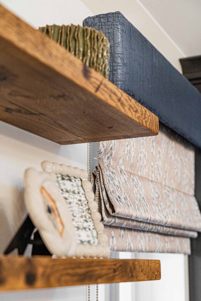 Wooden kitchen shelf styled with folded linens – Dingle project, designed by AK Interior, Cork, Ireland.