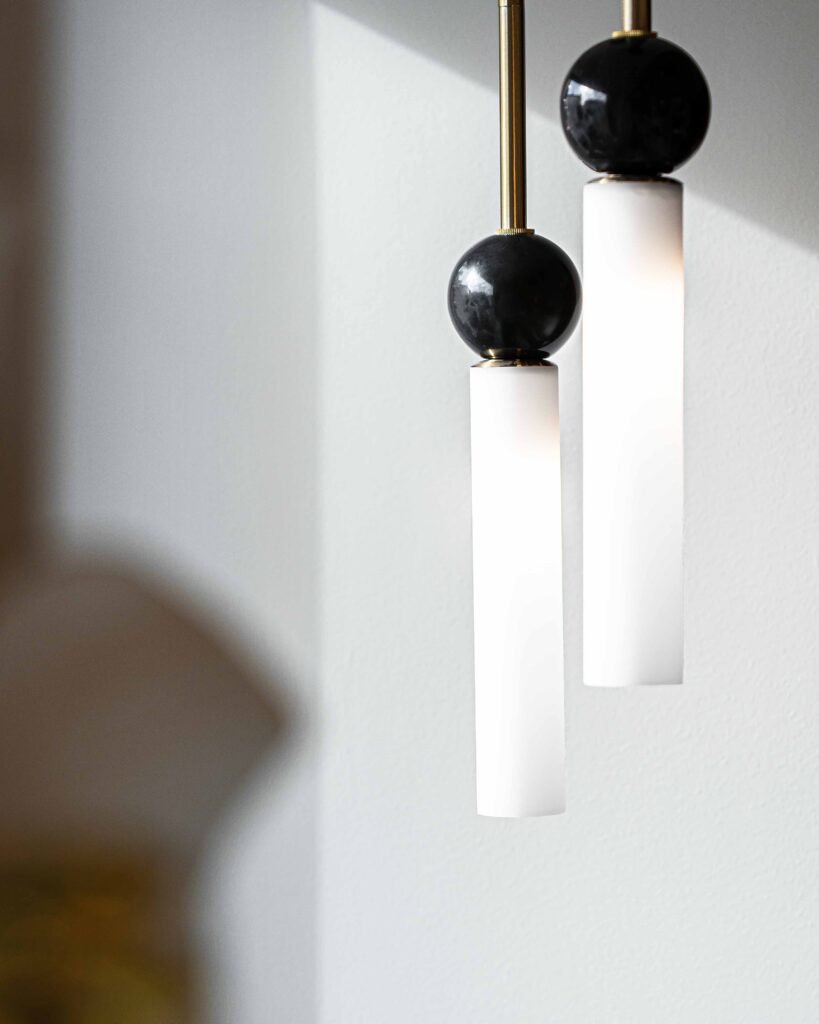 Modern pendant lights with marble spheres and elongated frosted shades – Bon Me project, designed by AK Interior Cork.