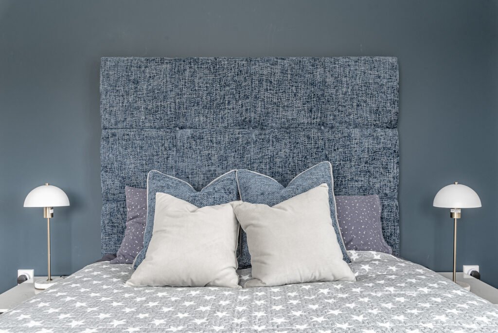 Soft blue headboard with decorative pillows – Monkstown Full House Design – AK Interior